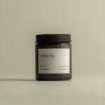 whitefigsoynaturalcandlewoodenwickamberglassjar